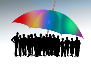 people-under-rainbow-umbrella