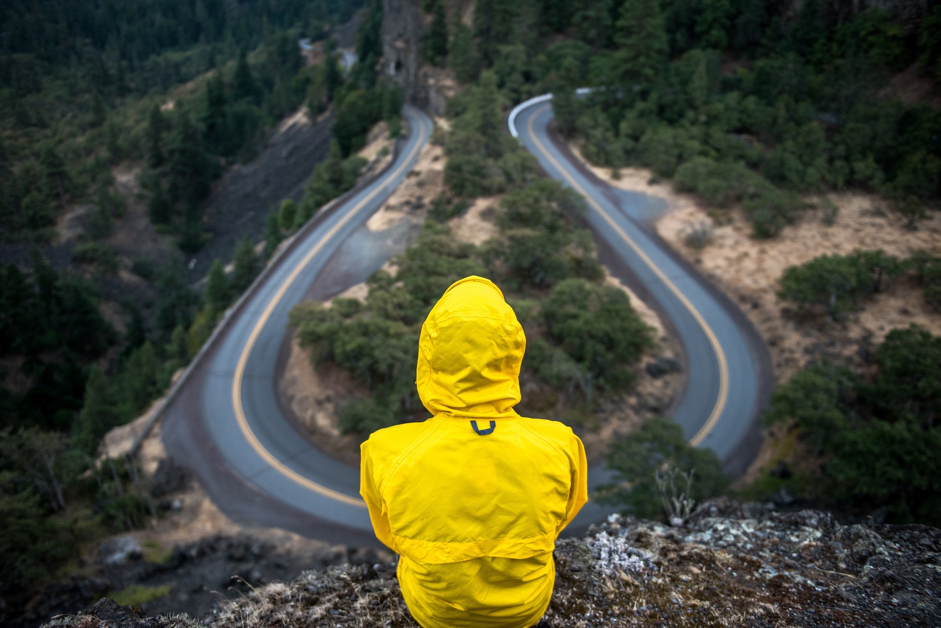 sitting-on-hill-looking-at-road